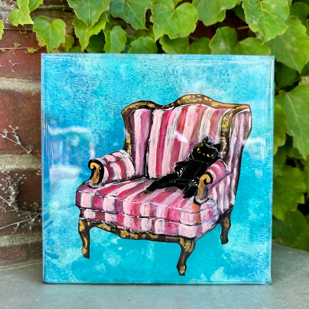Bad Kitty on Pink Striped Chair