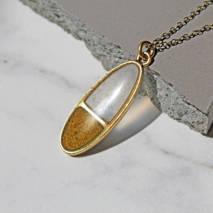 The Poppi Two Tone Oval Pendant Necklace